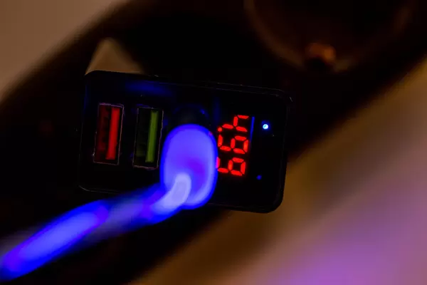 Close-up, mobile phone charger in the socket