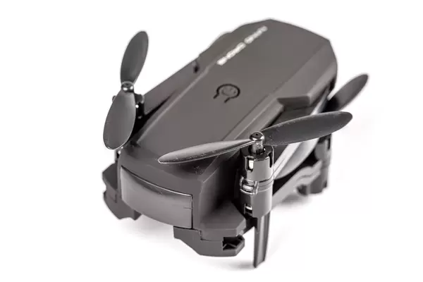 Close-up, new black drone on white