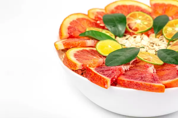 Close-up, oatmeal with citrus slices