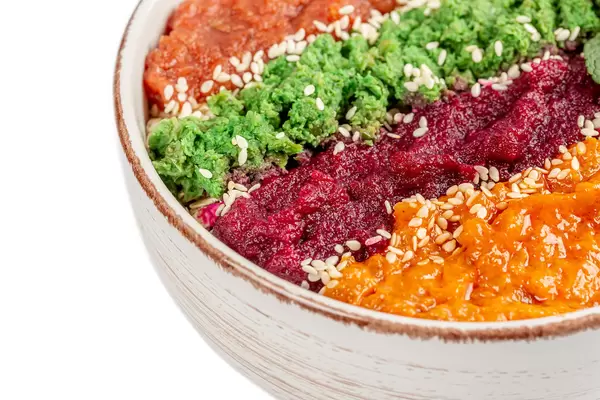 Close-up, oatmeal with different fruit purees