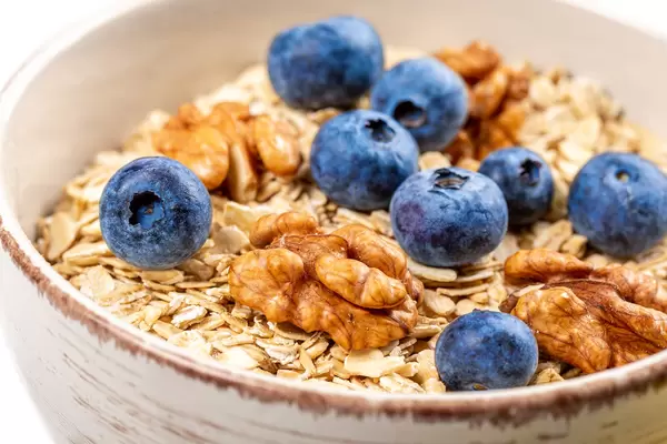 Close-up, oatmeal with walnuts and blueberries