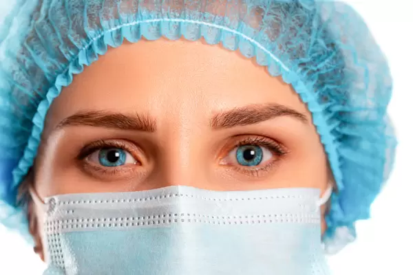 Close-up of a girl in a medical mask
