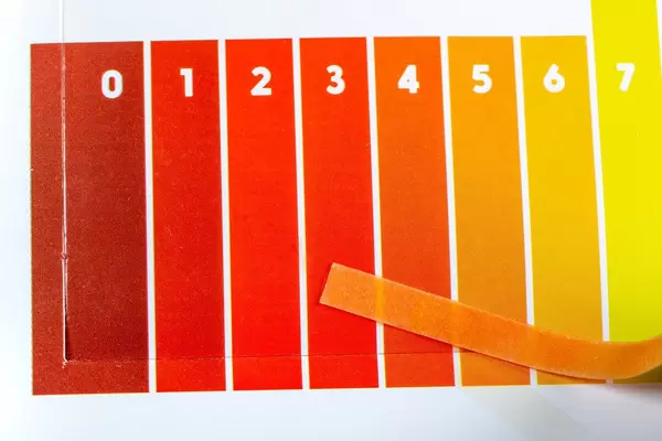 Close-up of a indicator paper with sour testing