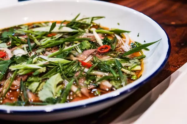 Close up of a pork with vegetables dish (Flip 2019)