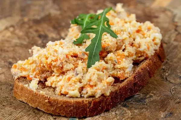 Close up of a sandwich with pate on an old wooden board (Flip 2020)