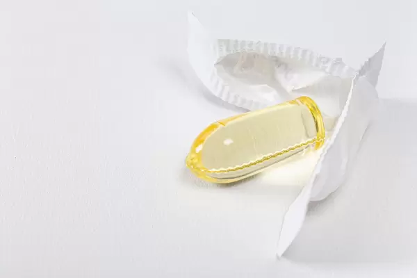 Close-up of an open suppository on a white background (Flip 2019)