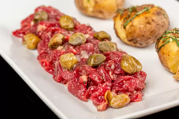 Close up of beef tartar with capers