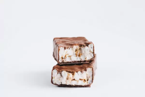 Close up of chocolate covered rice bar. Healthy eating.