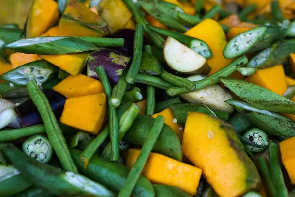 Close up of chopped squash and okra vegetables