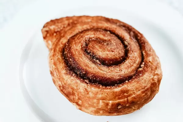 Close up of Cinnamon Roll on a white background.