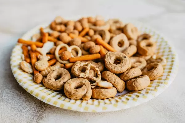 Close up of different kind of crackers and snack.