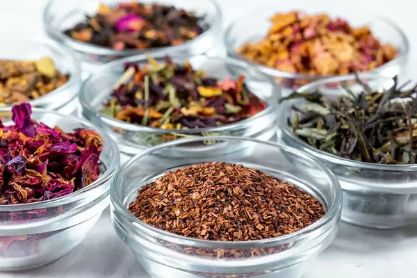 Close Up of Differrent Dried Teas in Small Glass Bowls