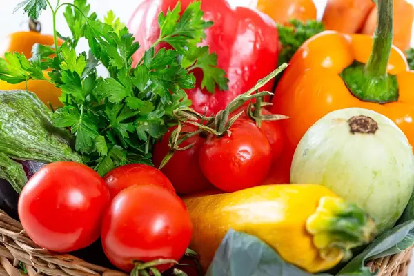 Close-up of fresh summer vegetables and greens