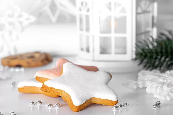 Close-up of gingerbread on Christmas background