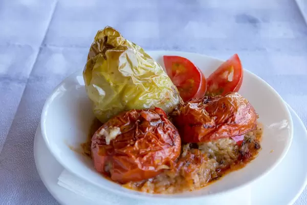 Close-up of Greek style stuffed tomatoes and peppers