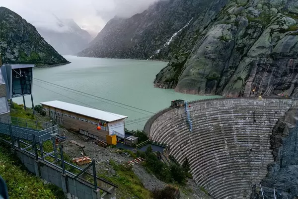Close up of Grimsel Pass dam and mountain lake behind it