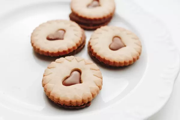 Close up of group of biscuits with chocolate hearts