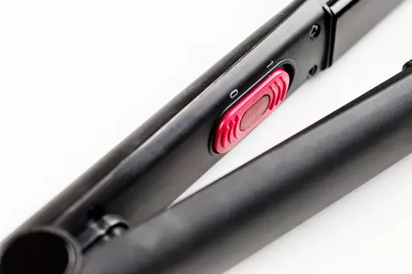 Close up of hair straightening iron