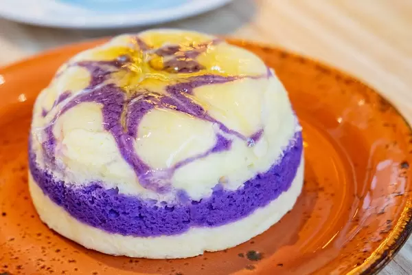 Close up of ice cream cake with sugar syrup toppings (Flip 2019)