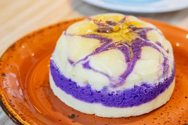 Close up of ice cream cake with sugar syrup toppings
