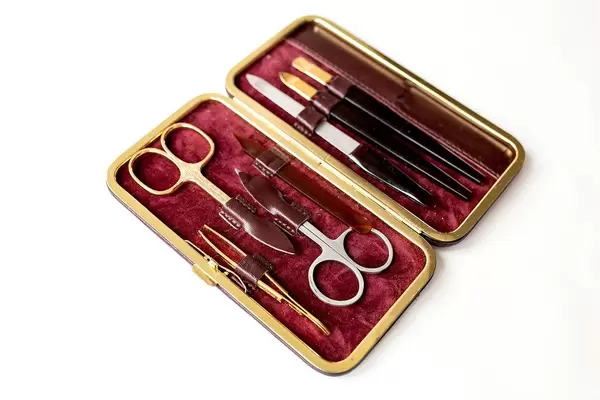 Close up of manicure set on white background (Flip 2019)