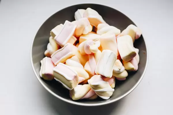 Close up of marshmallows in a grey plate
