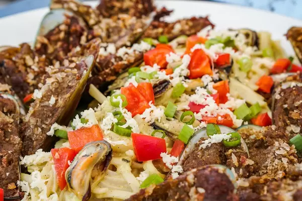 Close up of mussel pasta toppings (Flip 2019)