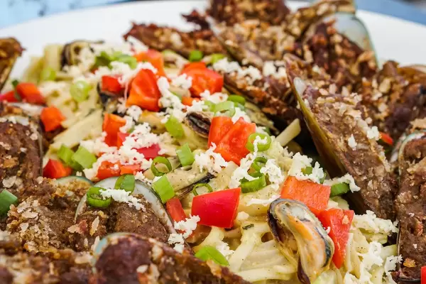 Close up of mussel pasta toppings