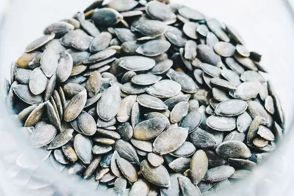 Close up of pumpkin seeds. Healthy food
