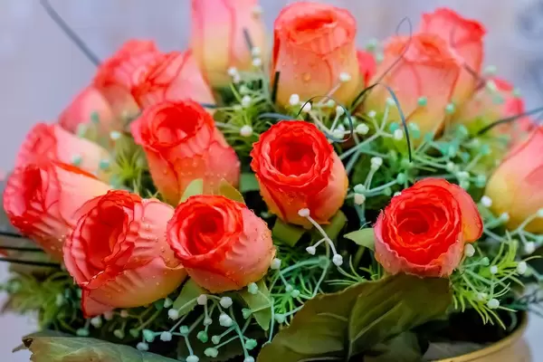 Close Up of Red Artificial Roses in Flower Bouquet