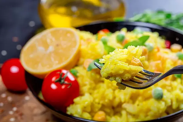 Close up of rice porridge on a fork (Flip 2019)