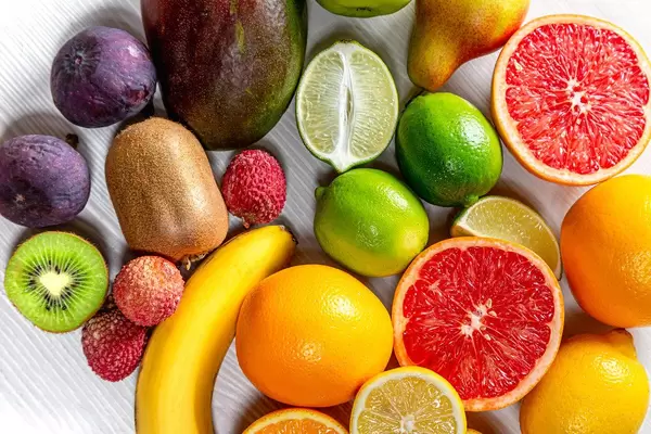 Close - up of ripe fresh fruit background. Top view
