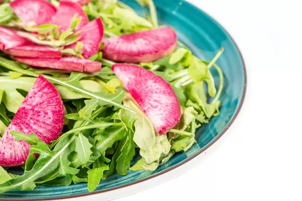 Close-up of salad with radish and arugula