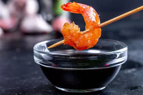 Close-up of shrimp tail and soy sauce (Flip 2019)