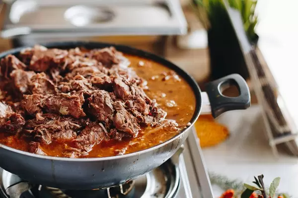 Close up of slow cooked beef. Street food.