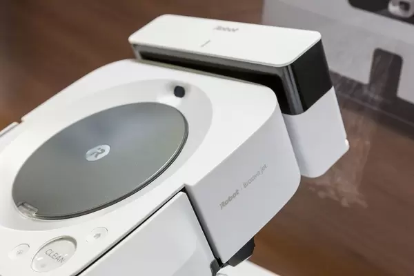 Close-up of the mop Robot m6 Braava jet with charging station