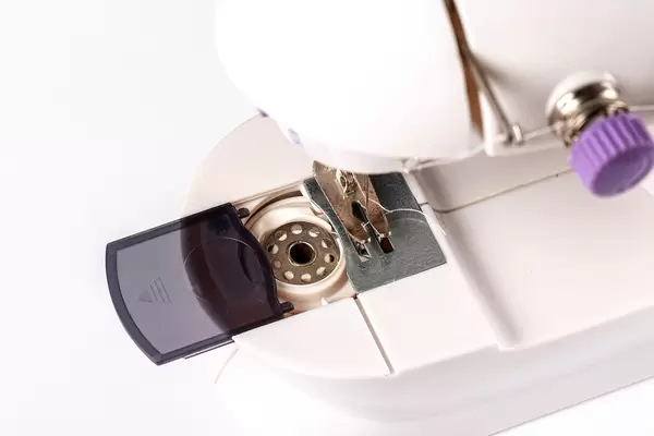 Close-up, part of a compact sewing machine