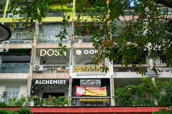 Close Up Photo of Cafes and Restaurants of The Cafe Apartment Building in the City Center of Saigon, Vietnam