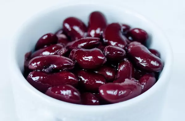 Close Up Photo of Red Beans on White Background