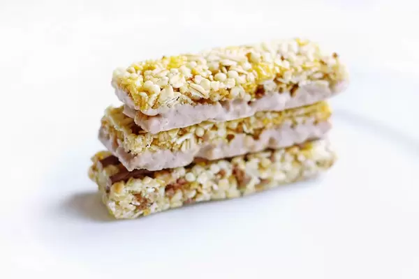 Close Up Photo of three Cereal Bars with White Chocolate stacked on each other