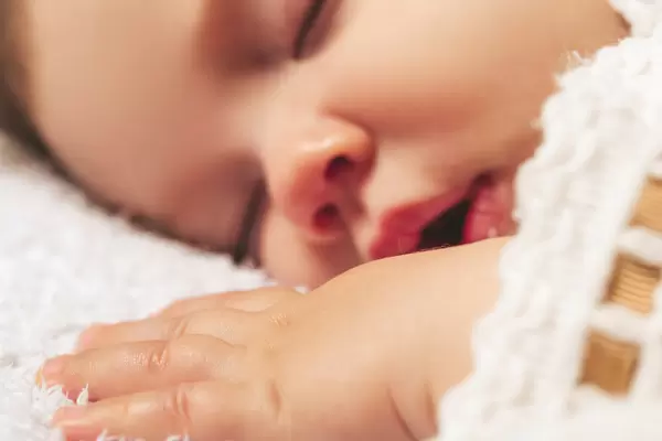 Close-up, portrait of a beautiful little boy while sleeping