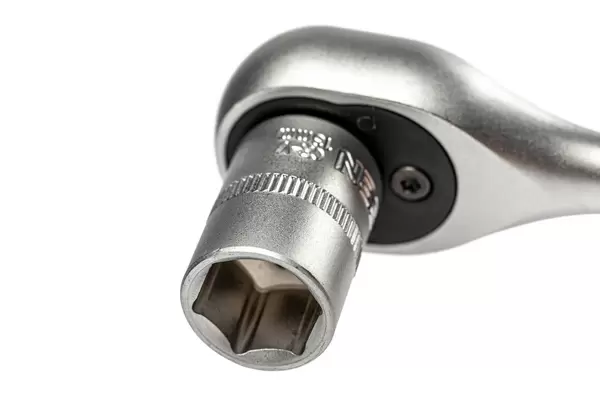 Close up ratchet wrench on white