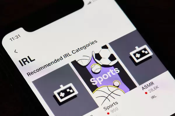 Close-up shot of a smartphone with Twitch video streaming service application on a screen