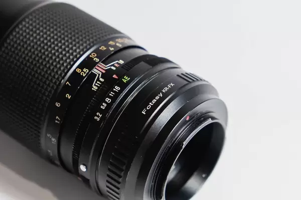 Close up shot of a vintage lens with adapter.jpg