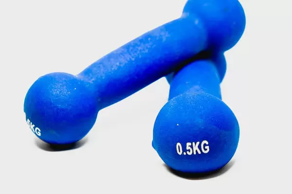 Close up shot of blue dumbbells