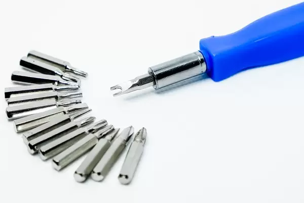 Close up shot of screwdriver bits facing the screwdriver handle