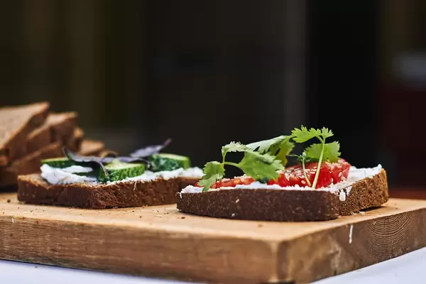 Close-up shot of toast snacks prepared with fresh vegetables