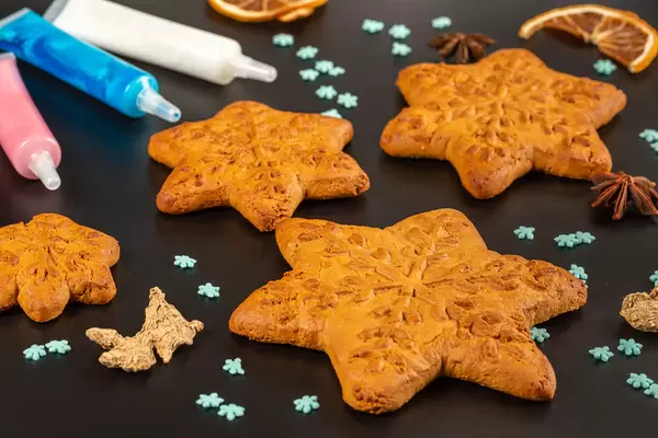 Close-up, snowflake gingerbread cookies, preparing for christmas