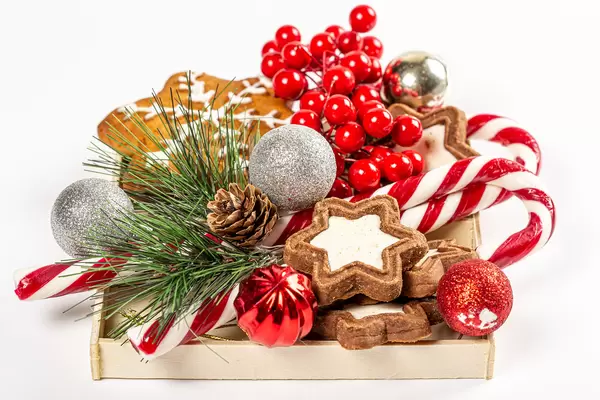 Close-up, stars cookies, candies and christmas decor in a box