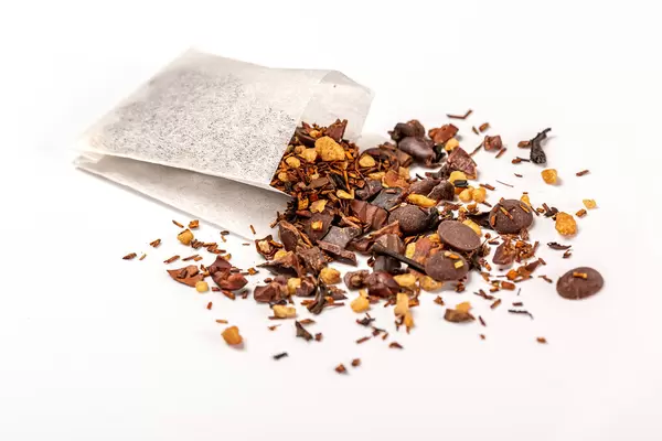 Close-up, tea with chocolate and pieces of nuts